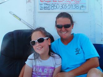 Tiffany Golden and her daughter at Treasure Island Marina ready to book trips.